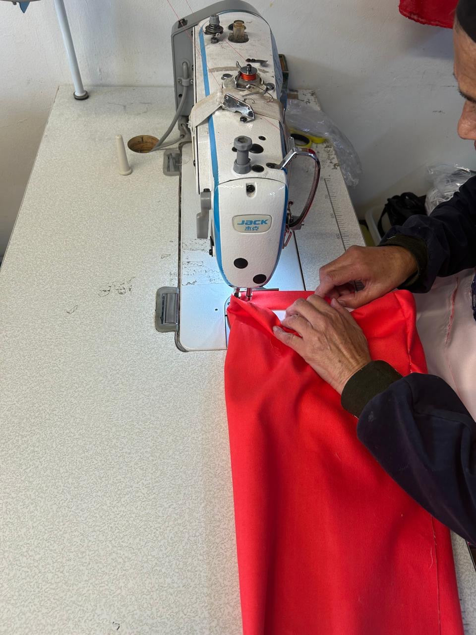 Schuhsäcke aus recyceltem Microfleece mit Logo bestickt