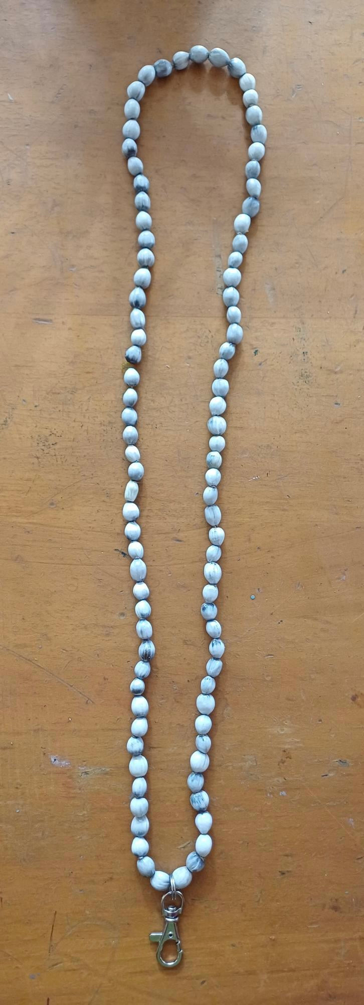 Handgefertigte Konferenz-Lanyards aus getrockneten Samen